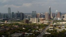 5.7K aerial stock footage descend by Congress Avenue leading to the city's skyline and state capitol, Downtown Austin, Texas Aerial Stock Footage | DX0002_103_033