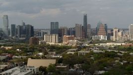 5.7K aerial stock footage reverse view and flyby of the city's skyline, Downtown Austin, Texas Aerial Stock Footage | DX0002_103_035