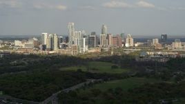 5.7K aerial stock footage of a wide view of city's towering skyline and Lady Bird Lake, Downtown Austin, Texas Aerial Stock Footage | DX0002_104_019