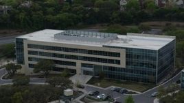 5.7K aerial stock footage of a modern office building in Austin, Texas Aerial Stock Footage | DX0002_104_025