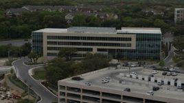 5.7K aerial stock footage of circling a modern office building in Austin, Texas Aerial Stock Footage | DX0002_104_028
