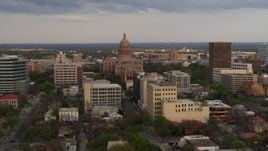 5.7K aerial stock footage of the Texas State Capitol building at sunset in Downtown Austin, Texas Aerial Stock Footage | DX0002_104_032