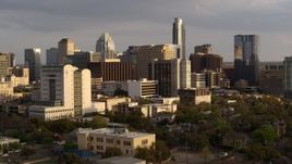 5.7K aerial stock footage of office buildings and skyscrapers near courthouse at sunset in Downtown Austin, Texas Aerial Stock Footage | DX0002_104_047
