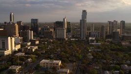 5.7K aerial stock footage of a view of skyscrapers at sunset during ascent in Downtown Austin, Texas Aerial Stock Footage | DX0002_105_001