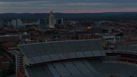 5.7K aerial stock footage of UT Tower at the University of Texas at twilight, Austin, Texas Aerial Stock Footage | DX0002_105_035