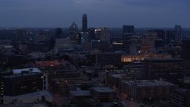 5.7K aerial stock footage fly away from office buildings, capitol and skyscrapers at twilight in Downtown Austin, Texas Aerial Stock Footage | DX0002_105_044