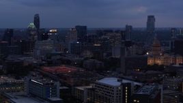 5.7K aerial stock footage of approaching office buildings, capitol and skyscrapers at twilight in Downtown Austin, Texas Aerial Stock Footage | DX0002_105_046