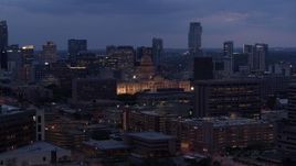 5.7K aerial stock footage flyby office buildings, capitol and skyscrapers at twilight in Downtown Austin, Texas Aerial Stock Footage | DX0002_105_049