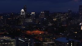 5.7K aerial stock footage approach office buildings and skyscrapers at night in Downtown Austin, Texas Aerial Stock Footage | DX0002_106_001
