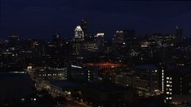 5.7K aerial stock footage of office buildings, skyscrapers while descending at night in Downtown Austin, Texas Aerial Stock Footage | DX0002_106_005