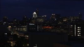 5.7K aerial stock footage ascend and approach office buildings, skyscrapers at night in Downtown Austin, Texas Aerial Stock Footage | DX0002_106_006