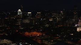 5.7K aerial stock footage slowly fly toward skyscrapers and office buildings at night in Downtown Austin, Texas Aerial Stock Footage | DX0002_106_015
