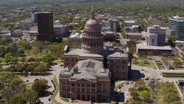 5.7K aerial stock footage of an orbit around the side of Texas State Capitol and grounds in Downtown Austin, Texas Aerial Stock Footage | DX0002_107_008