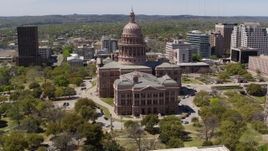 5.7K aerial stock footage descend by the side of Texas State Capitol and grounds in Downtown Austin, Texas Aerial Stock Footage | DX0002_107_009