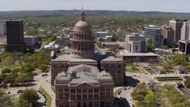 5.7K aerial stock footage ascend while approaching Texas State Capitol in Downtown Austin, Texas Aerial Stock Footage | DX0002_107_010