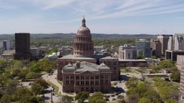 5.7K aerial stock footage descending while focused on the Texas State Capitol, Downtown Austin, Texas Aerial Stock Footage | DX0002_107_030