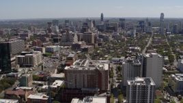 5.7K aerial stock footage of a wide view of the city's skyline seen from the University of Texas, Downtown Austin, Texas Aerial Stock Footage | DX0002_107_039