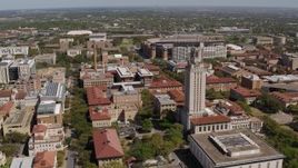 5.7K aerial stock footage of slowly flying by campus buildings and UT Tower at the University of Texas, Austin, Texas Aerial Stock Footage | DX0002_107_043