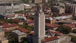 5.7K aerial stock footage ascend and circle the UT Tower at the University of Texas, Austin, Texas Aerial Stock Footage | DX0002_108_003