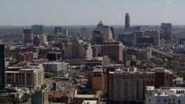 5.7K aerial stock footage descend and flyby the capitol, office buildings and city skyline in Downtown Austin, Texas Aerial Stock Footage | DX0002_108_008