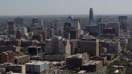5.7K aerial stock footage of passing the capitol and office buildings, and city skyline in Downtown Austin, Texas Aerial Stock Footage | DX0002_108_010