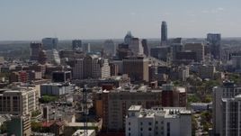 5.7K aerial stock footage of passing the capitol and office buildings, and city skyline in Downtown Austin, Texas Aerial Stock Footage | DX0002_108_012