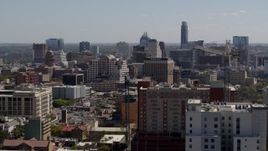 5.7K aerial stock footage slowly passing the capitol and office buildings, and city skyline in Downtown Austin, Texas Aerial Stock Footage | DX0002_108_013