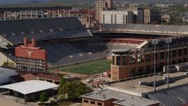 5.7K aerial stock footage of the empty football stadium at the University of Texas, Austin, Texas Aerial Stock Footage | DX0002_108_024