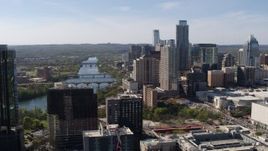 5.7K aerial stock footage ascend for a view of the city's skyline and Lady Bird Lake in Downtown Austin, Texas Aerial Stock Footage | DX0002_108_044