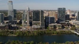 5.7K aerial stock footage of The Northshore skyscraper on the other side of Lady Bird Lake, Downtown Austin, Texas Aerial Stock Footage | DX0002_109_010