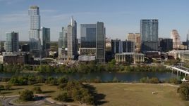 5.7K aerial stock footage approach and flyby The Northshore skyscraper on the other side of Lady Bird Lake, Downtown Austin, Texas Aerial Stock Footage | DX0002_109_012