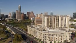 5.7K aerial stock footage of the city's waterfront skyline seen from apartment building and hotel, Austin, Texas Aerial Stock Footage | DX0002_109_019