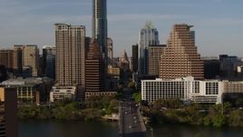 5.7K aerial stock footage of revealing the Texas State Capitol seen between skyscrapers in Downtown Austin, Texas Aerial Stock Footage | DX0002_109_030