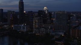 5.7K aerial stock footage fly away from San Jacinto Center at twilight in Downtown Austin, Texas Aerial Stock Footage | DX0002_110_042