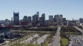 5.7K aerial stock footage approaching the city's skyline near the river during ascent in Downtown Nashville, Tennessee Aerial Stock Footage | DX0002_112_004