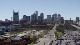 5.7K aerial stock footage reverse view of the city's skyline near the river during descent in Downtown Nashville, Tennessee Aerial Stock Footage | DX0002_112_005