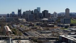 5.7K aerial stock footage ascend and approach the city's skyline, Downtown Nashville, Tennessee Aerial Stock Footage | DX0002_113_009