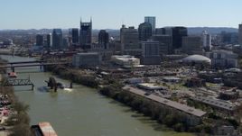 5.7K aerial stock footage of skyscrapers in the city's skyline, seen from the river, Downtown Nashville, Tennessee Aerial Stock Footage | DX0002_113_011
