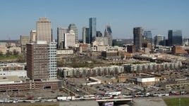 5.7K aerial stock footage of the city's skyline seen from apartment complexes in Downtown Nashville, Tennessee Aerial Stock Footage | DX0002_113_016