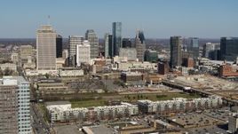 5.7K aerial stock footage of the city's skyline seen while ascending near apartment complexes in Downtown Nashville, Tennessee Aerial Stock Footage | DX0002_113_017