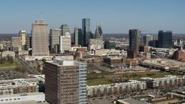 5.7K aerial stock footage flyby office and apartment buildings, ascend for view of skyline in Downtown Nashville, Tennessee Aerial Stock Footage | DX0002_113_022