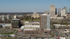 5.7K aerial stock footage of descending by a group of office buildings, Nashville, Tennessee Aerial Stock Footage | DX0002_113_027