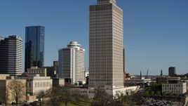 5.7K aerial stock footage of a low altitude orbit of Tennessee Tower in Downtown Nashville, Tennessee Aerial Stock Footage | DX0002_113_044
