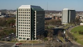 5.7K aerial stock footage of orbiting a government office building to reveal a second building in Downtown Nashville, Tennessee Aerial Stock Footage | DX0002_113_045