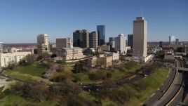 5.7K aerial stock footage reverse view of the Tennessee State Capitol, skyscrapers, Tennessee Tower in Downtown Nashville, Tennessee Aerial Stock Footage | DX0002_114_006