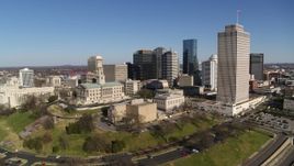5.7K aerial stock footage descend and orbit Tennessee State Capitol, skyscrapers, Tennessee Tower in Downtown Nashville, Tennessee Aerial Stock Footage | DX0002_114_009