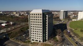5.7K aerial stock footage orbit Andrew Johnson Tower, a government office building in Downtown Nashville, Tennessee Aerial Stock Footage | DX0002_114_012