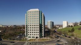 5.7K aerial stock footage stationary view of Andrew Johnson Tower, a government office building in Downtown Nashville, Tennessee Aerial Stock Footage | DX0002_114_013