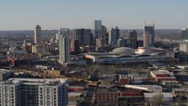 5.7K aerial stock footage ascend for view of convention center and skyline in Downtown Nashville, Tennessee Aerial Stock Footage | DX0002_114_014