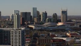 5.7K aerial stock footage stationary view of city's tall skyline, Nashville Music City Center in Downtown Nashville, Tennessee Aerial Stock Footage | DX0002_114_042